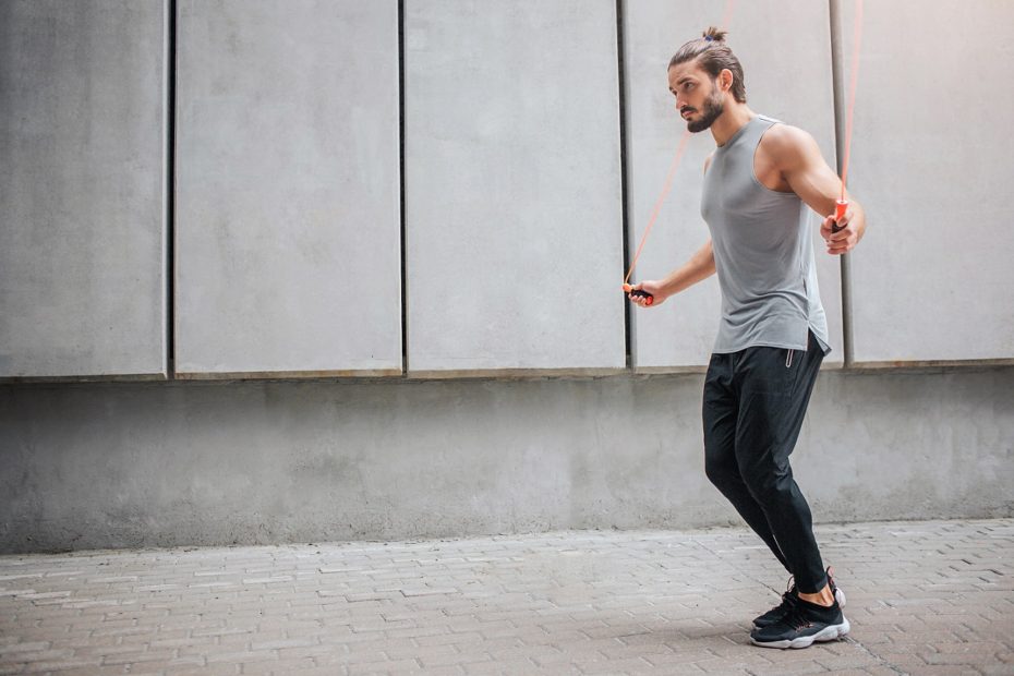 man learning how to jump rope for beginners