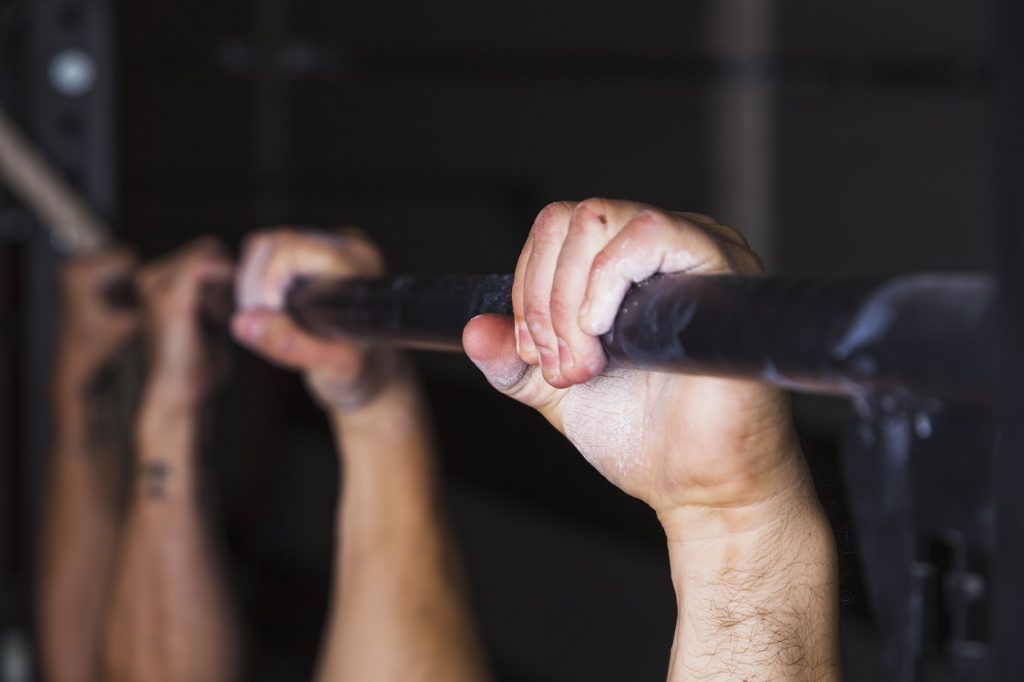 hanging from pullup bar