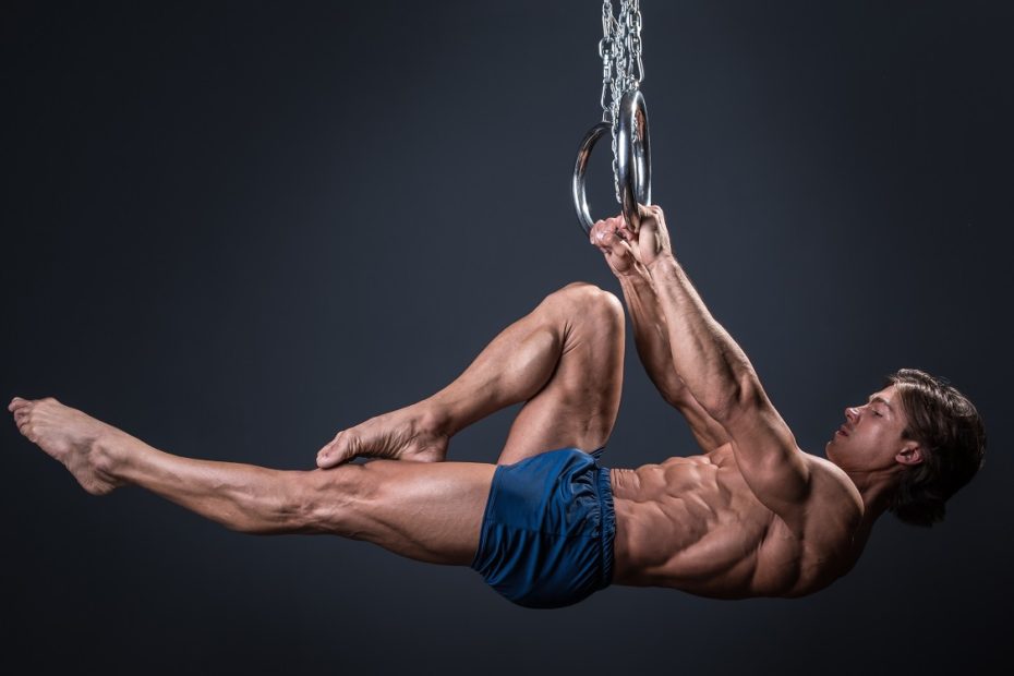 man performing front lever