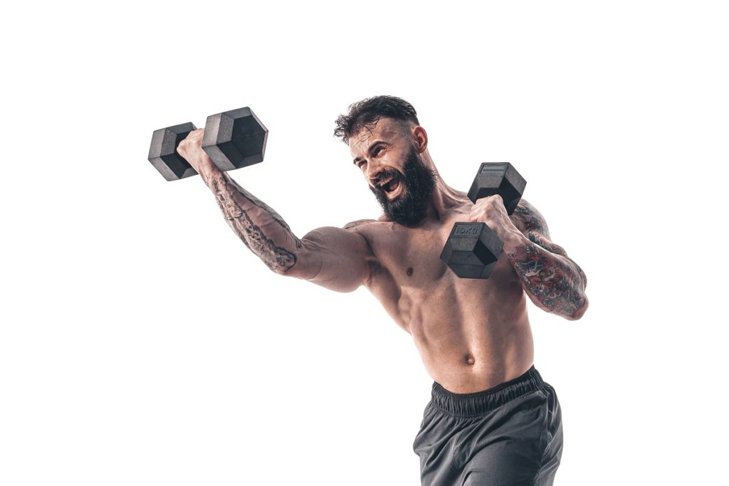 man performing shoulder workout with dumbbells